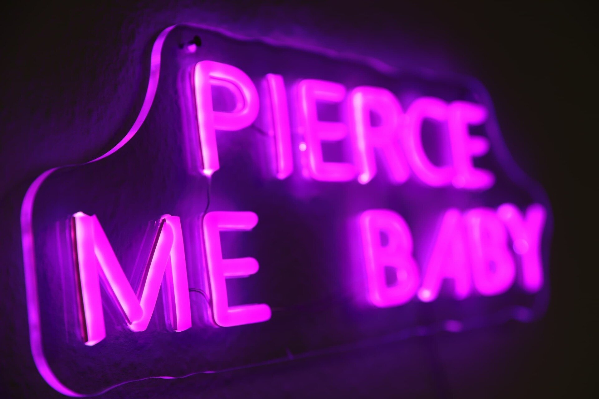 A neon sign inside the studio