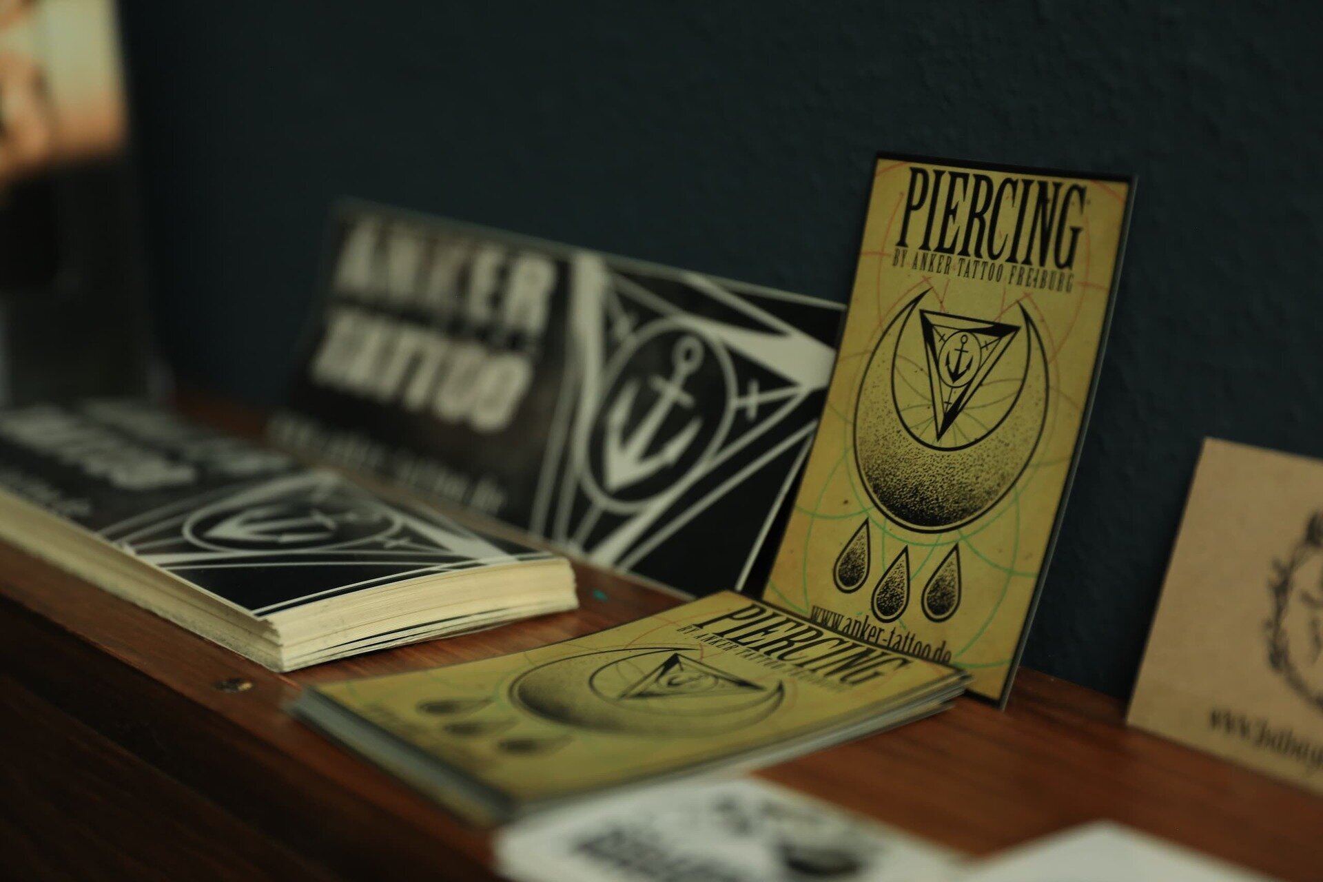 A sticker from Anker Tattoo & Piercing Studio in Freiburg